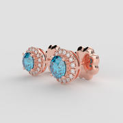 Blue Topaz Halo Stud Earrings